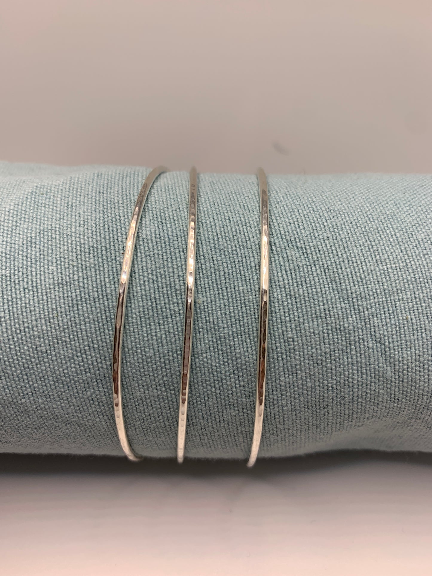 Handmade hammered sterling silver bangles