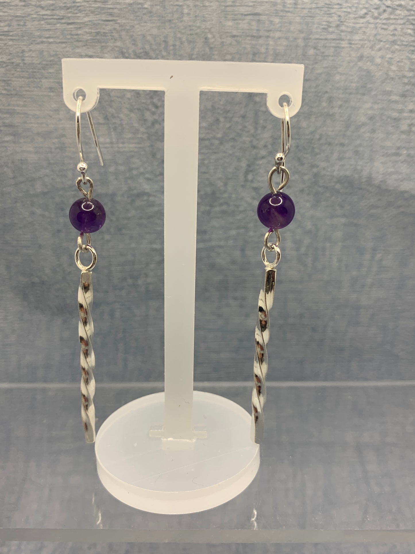 Handmade sterling silver long twisted earrings with amethyst