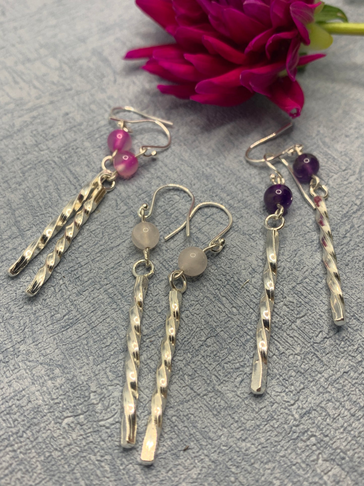 Handmade sterling silver long twisted earrings with rose quartz and amethyst gemstones