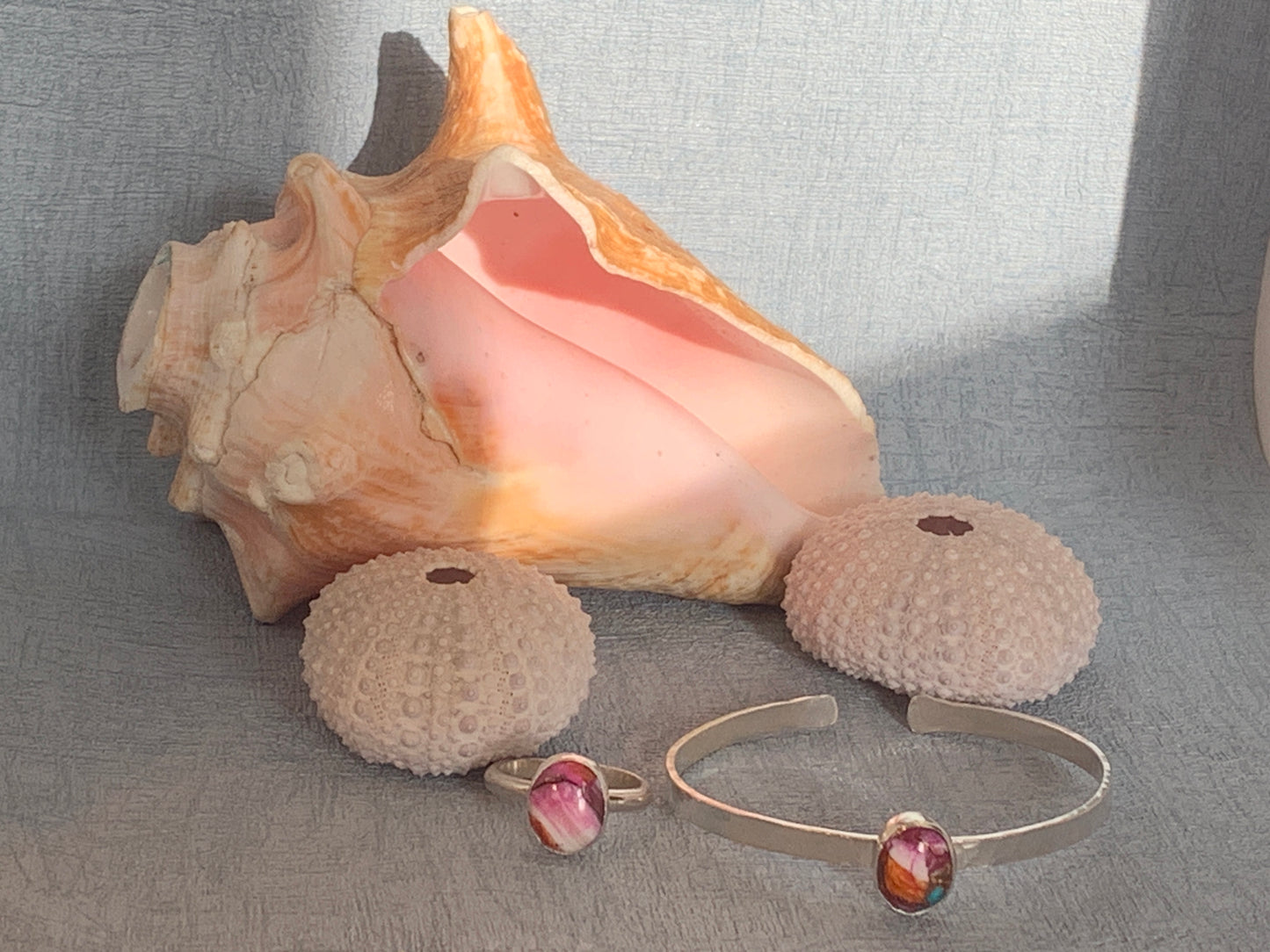handmade hammered sterling silver cuff and silver ring with spiny oyster turquoise gemstone