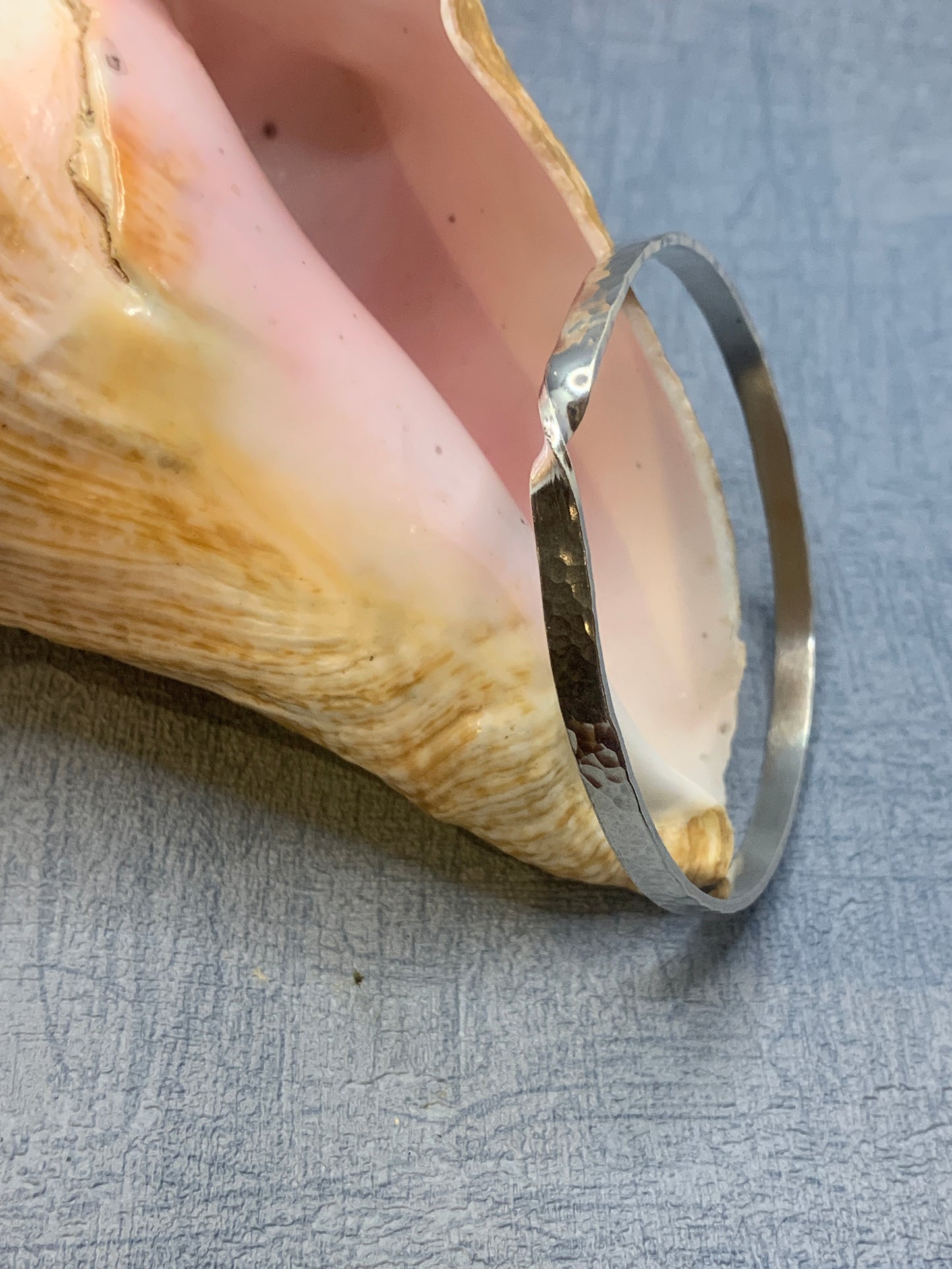 Handmade hammered sterling silver bangle