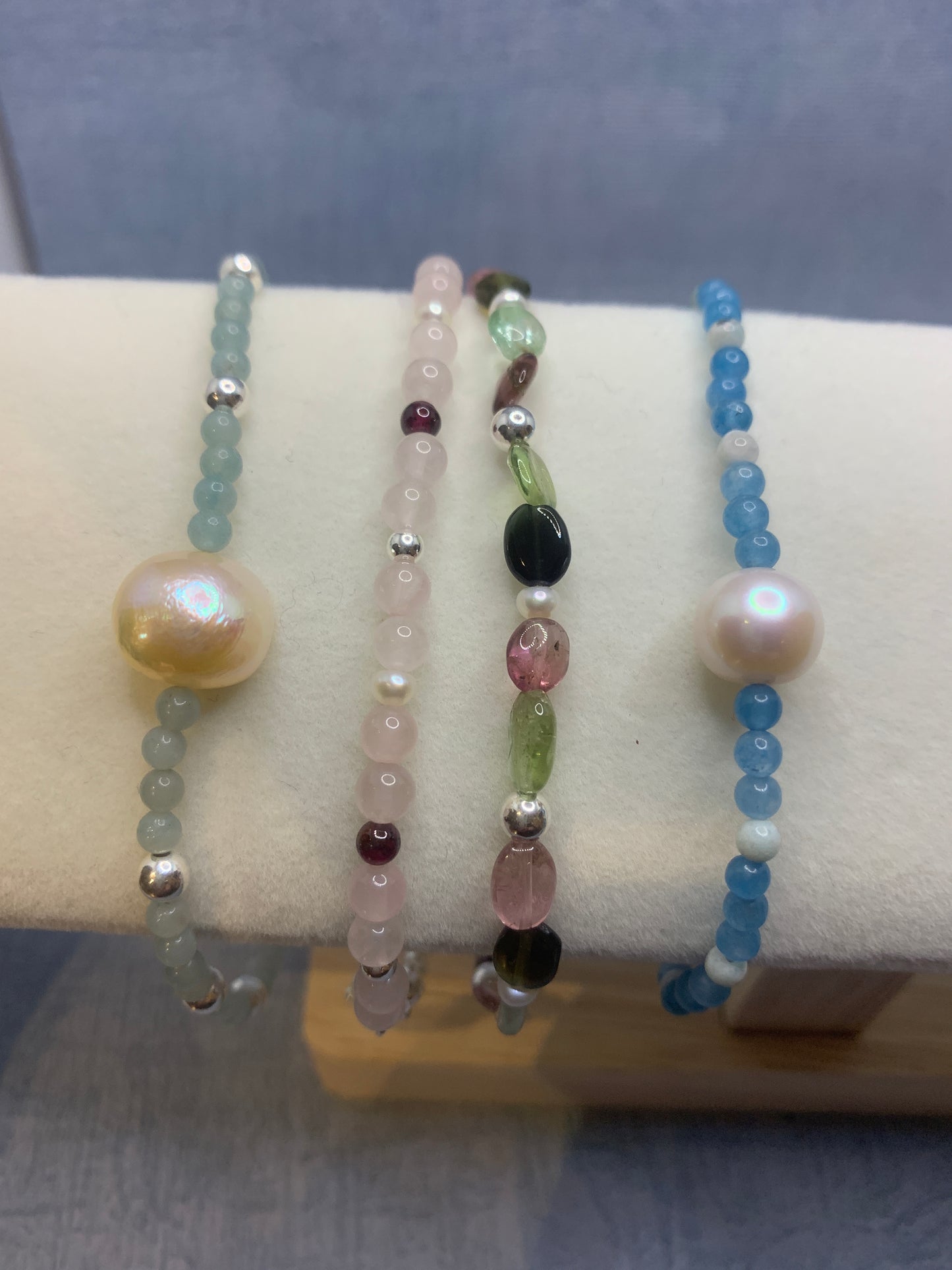 Handmade gemstone bracelets with amazonite, rose quartz, garnet, tourmalines and apatite with sterling silver