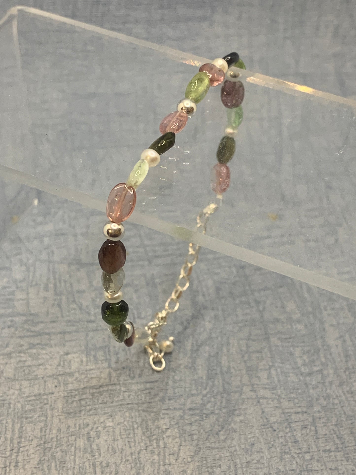 Handmade bracelet with pink, green and aqua tourmalines gemstones with sterling silver