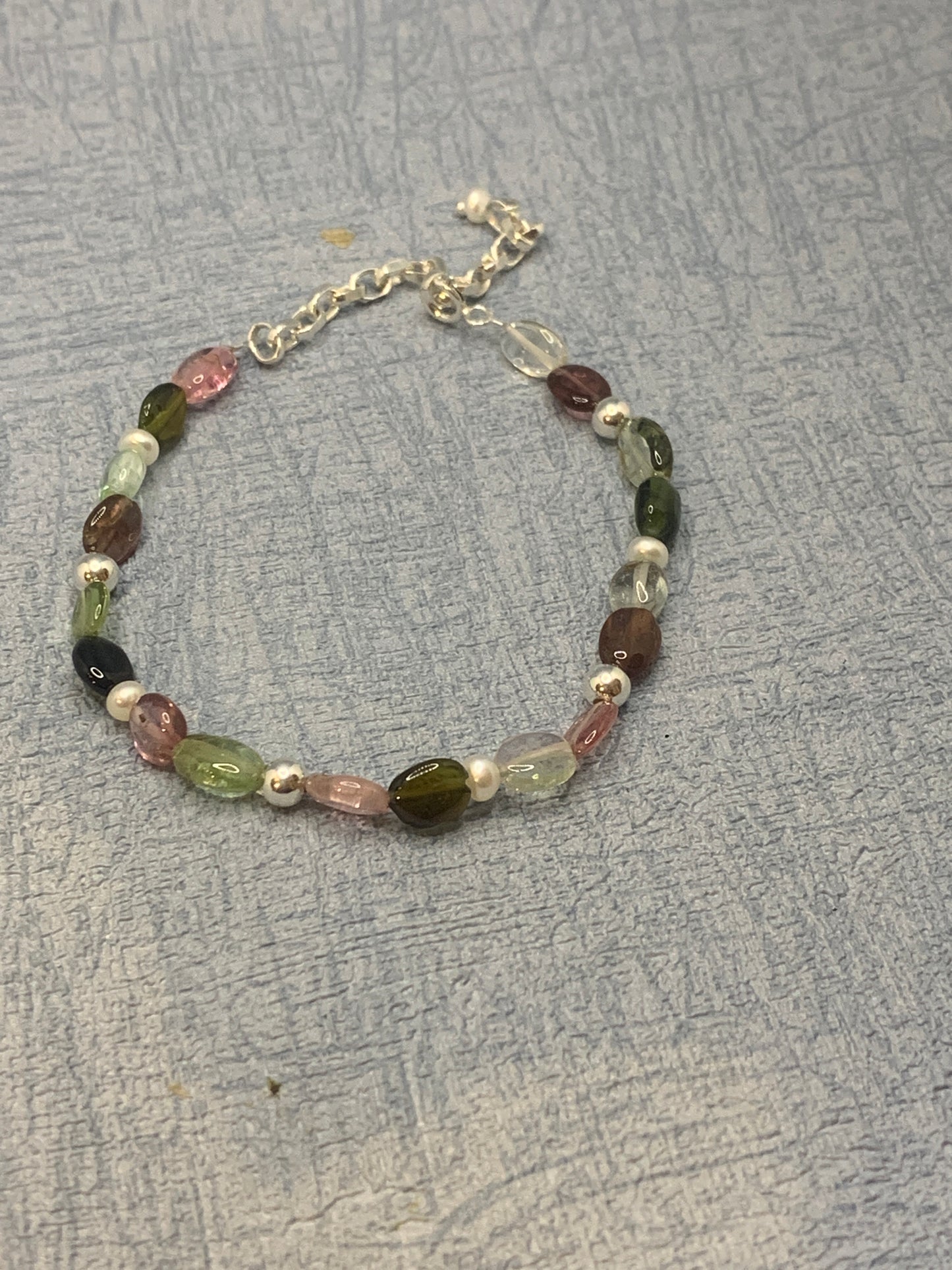 Handmade bracelet with pink, green and aqua tourmalines gemstones with sterling silver