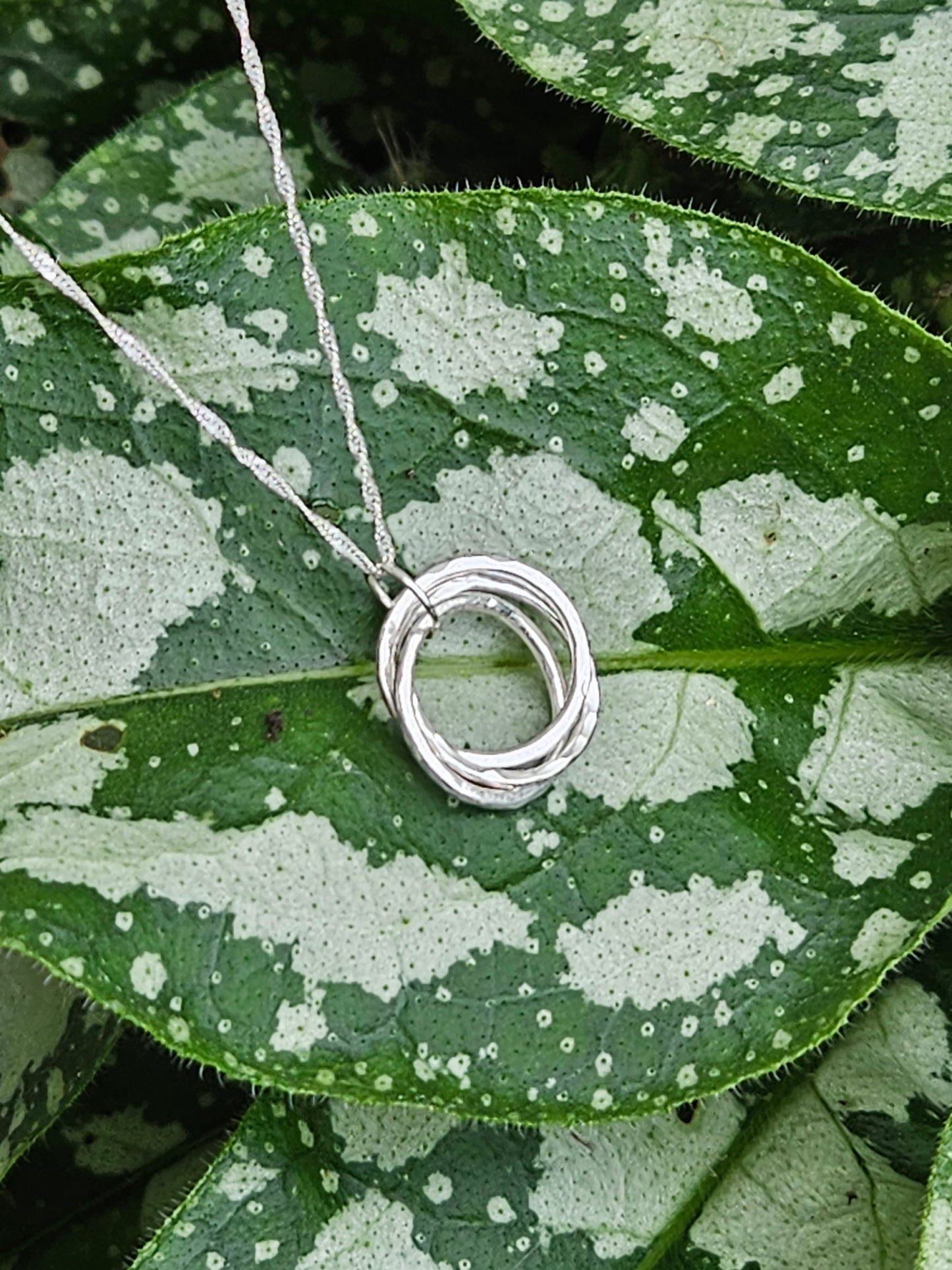 Handmade sterling silver three hammered russian twist rings pendant