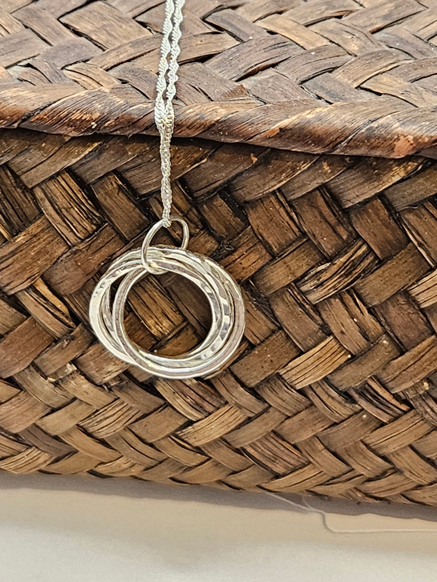 Handmade sterling silver trio of circles russian twist pendant