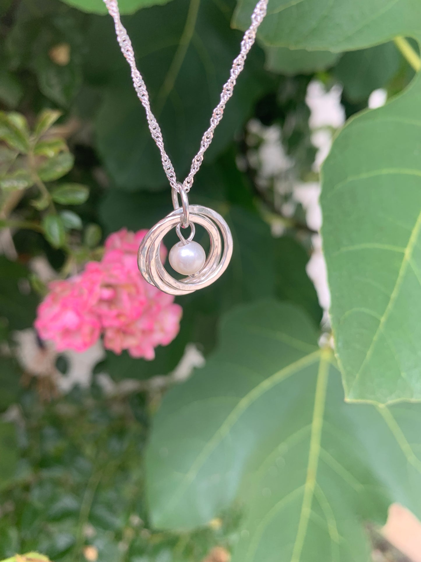 Handmade sterling silver three ring pendant with pearl