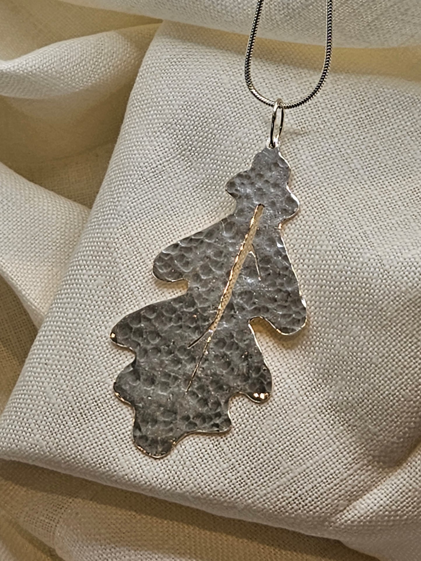 Handmade sterling silver hammered oak leaf pendant