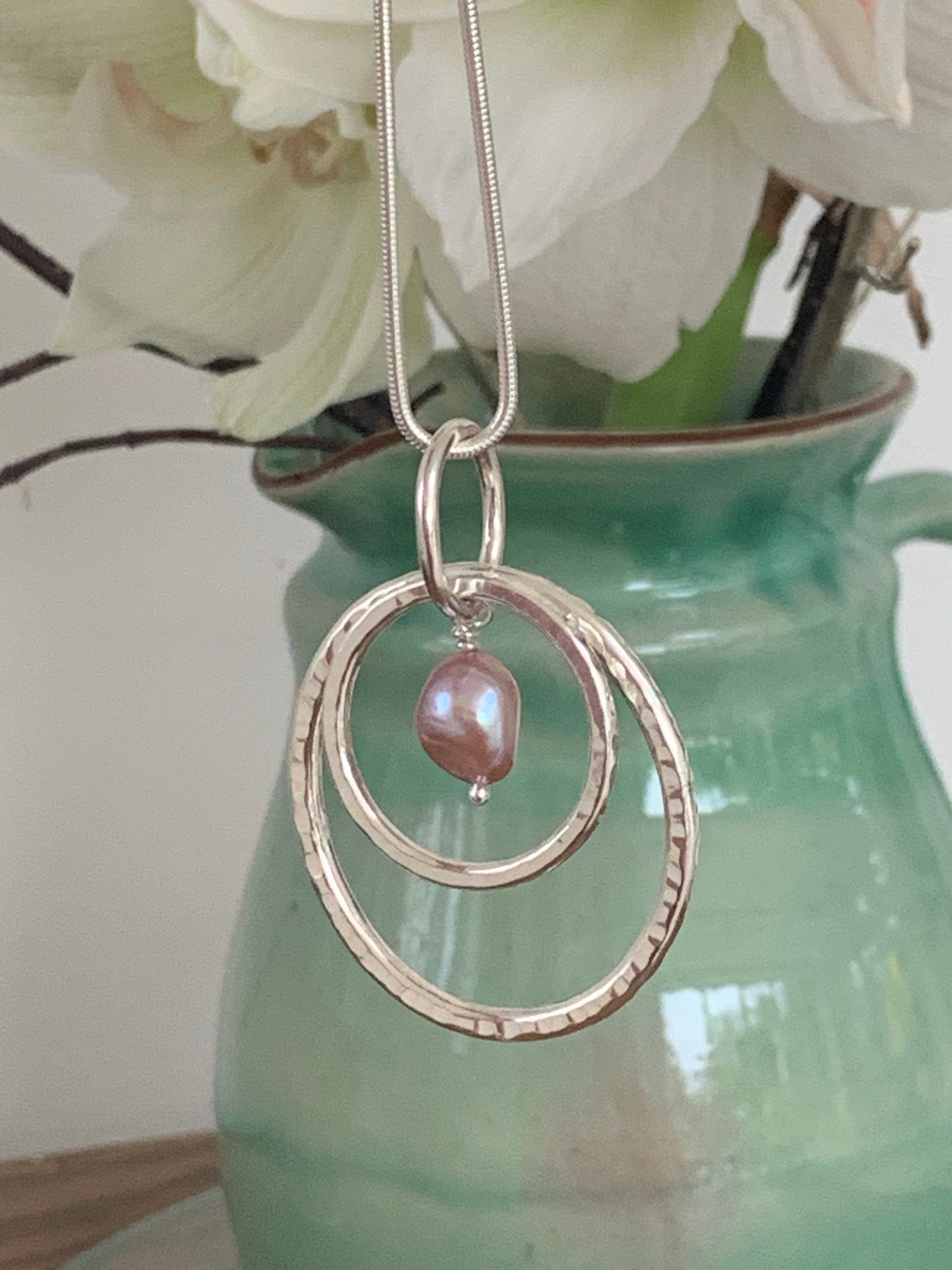 Handmade sterling silver hammered double ring pendant with pearl