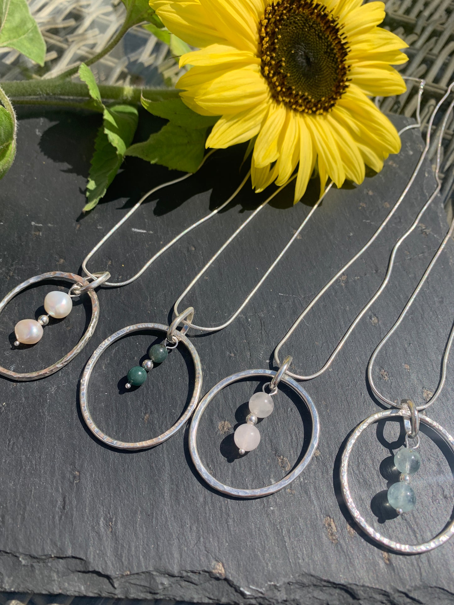 Handmade sterling silver hammered ring pendant with aquamarine, moss agate, pearls and rose quartz