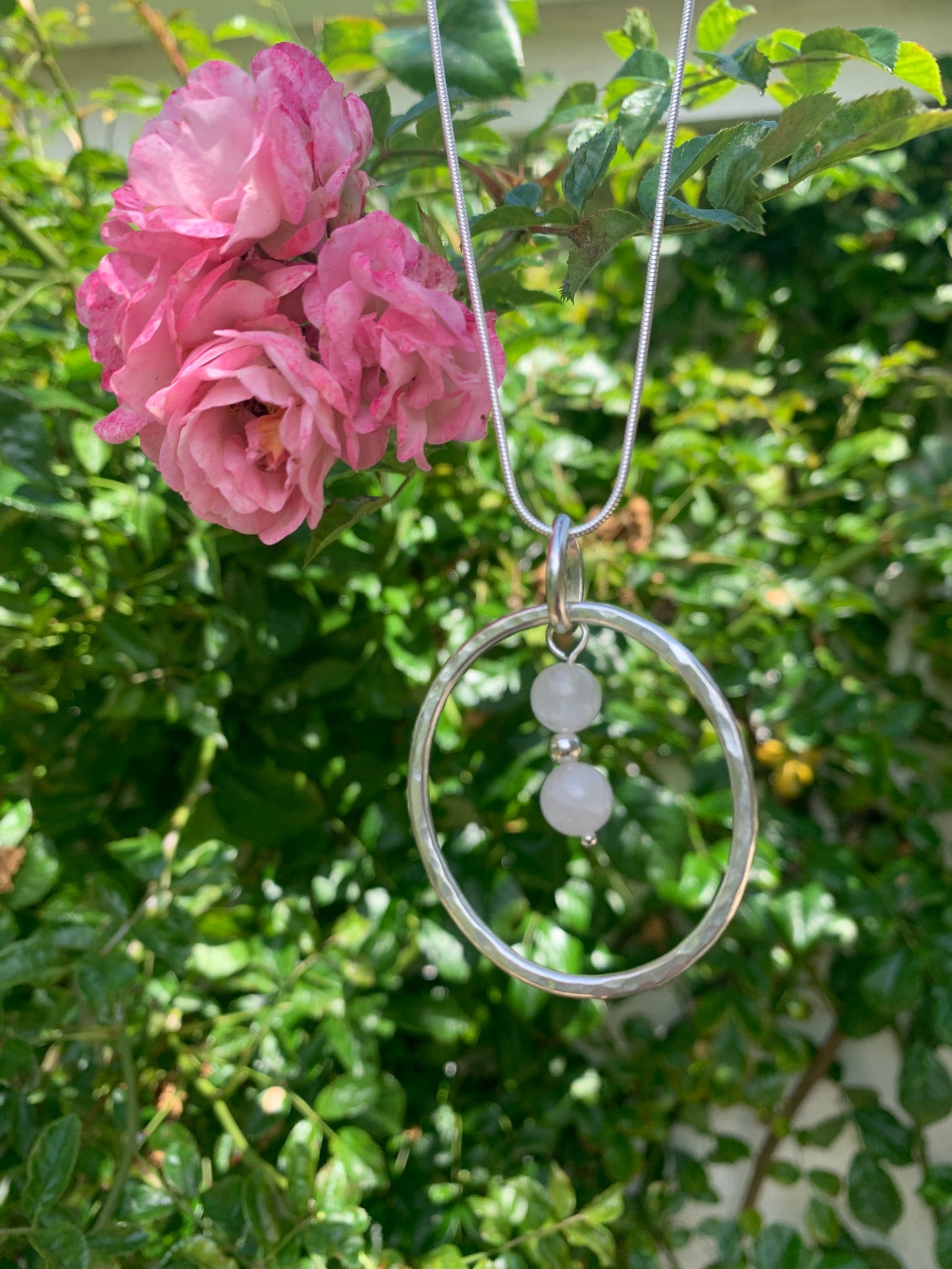 Handmade sterling silver hammered ring pendant with rose quartz