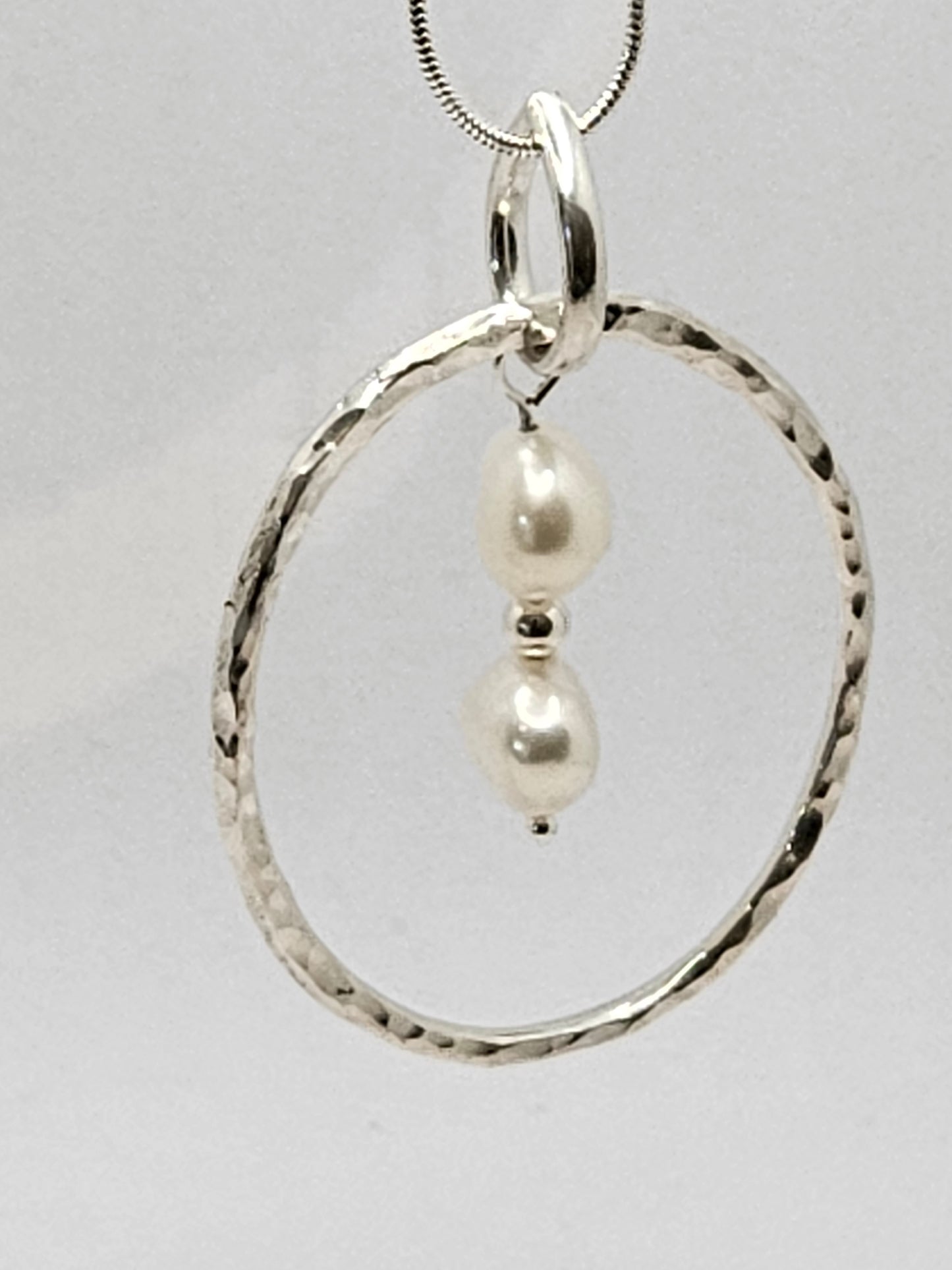 Handmade sterling silver hammered ring pendant with pearl