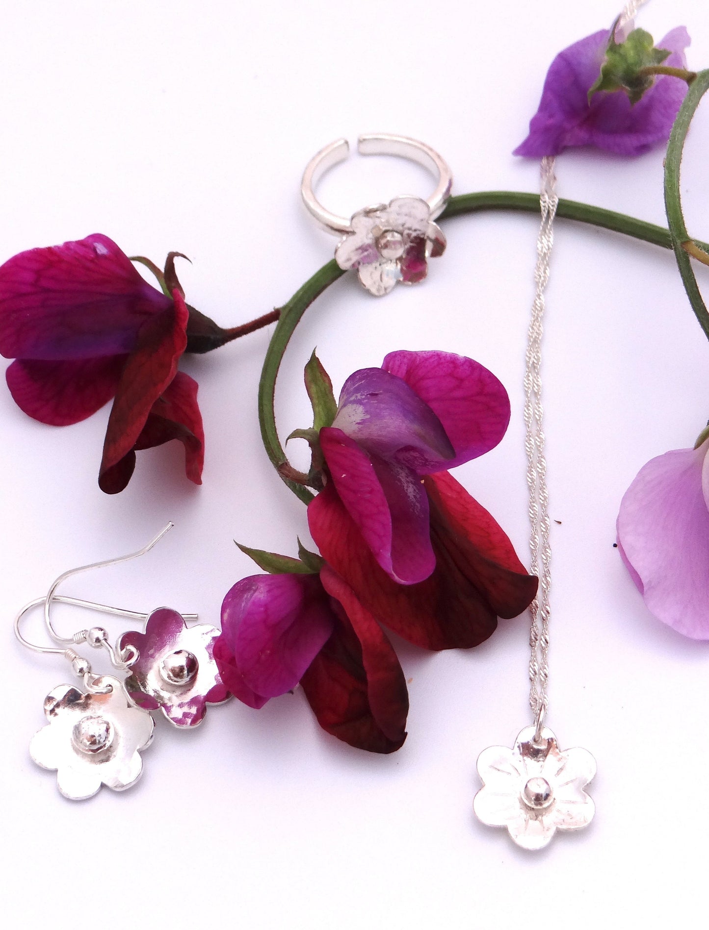 handmade sterling silver flower earrings, flower ring and flower pendant