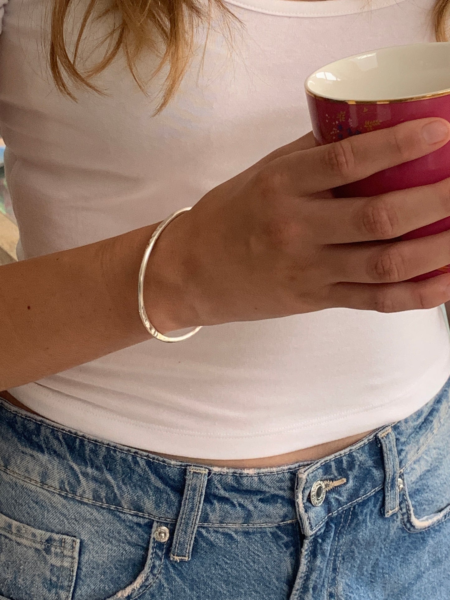 Handmade sterling silver hammered heavy bangle