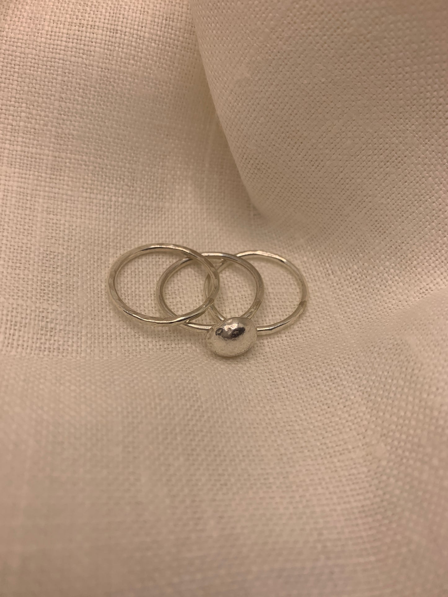 Handmade sterling silver hammered trio of stacking rings