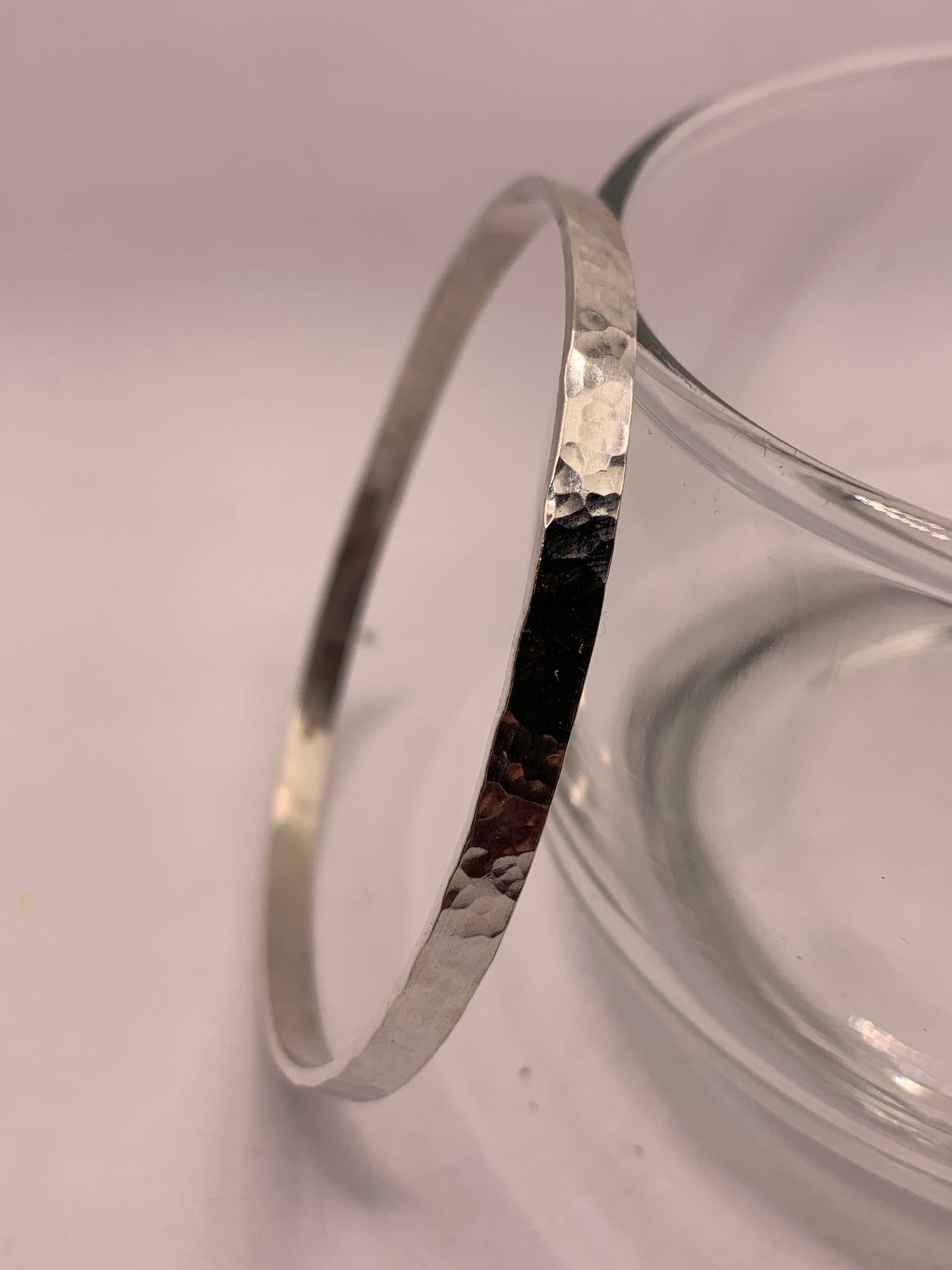 Handmade sterling silver hammered bangle