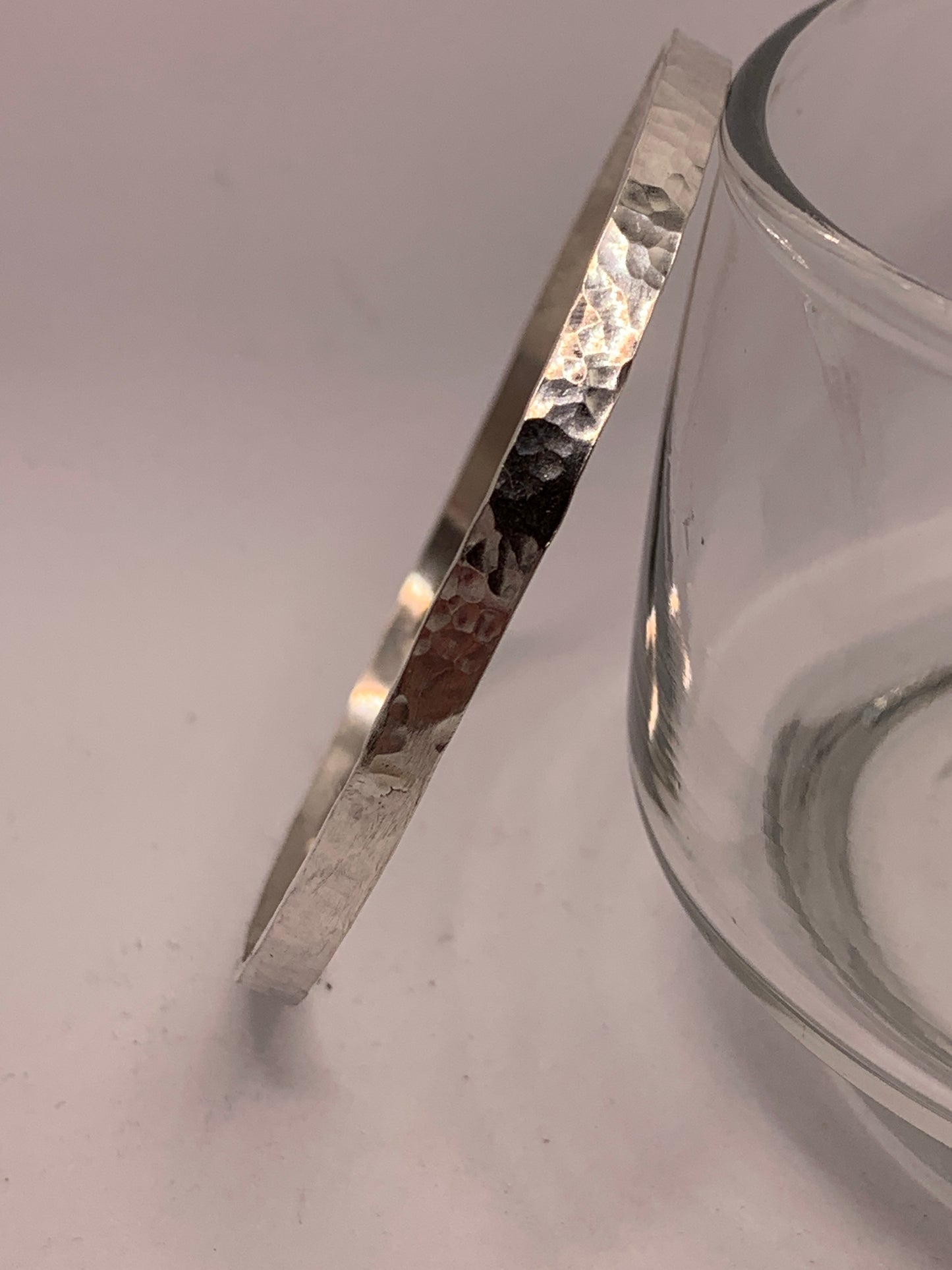 Handmade sterling silver hammered bangle