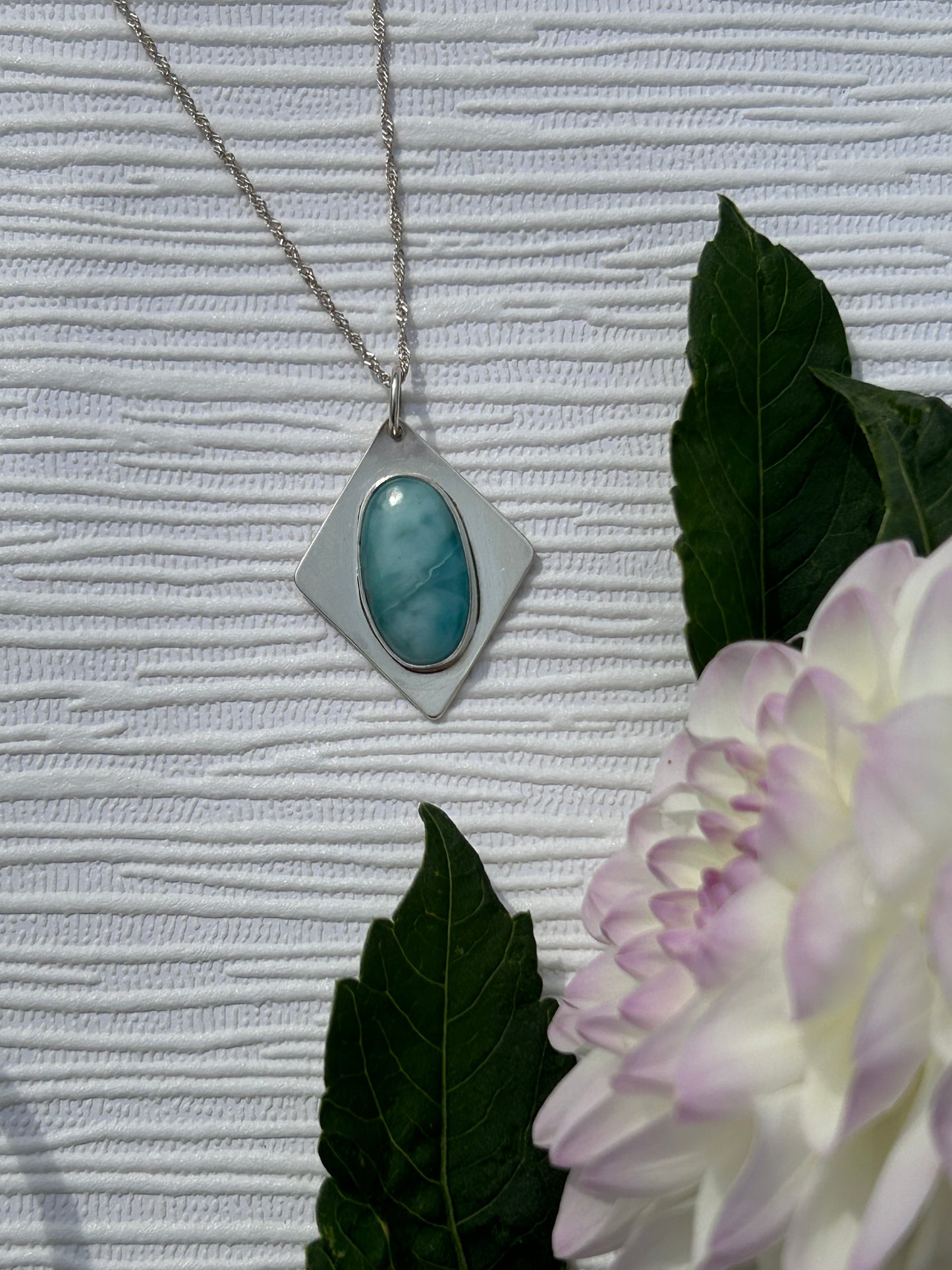 Handcrafted sterling silver pendant with larimar gemstone