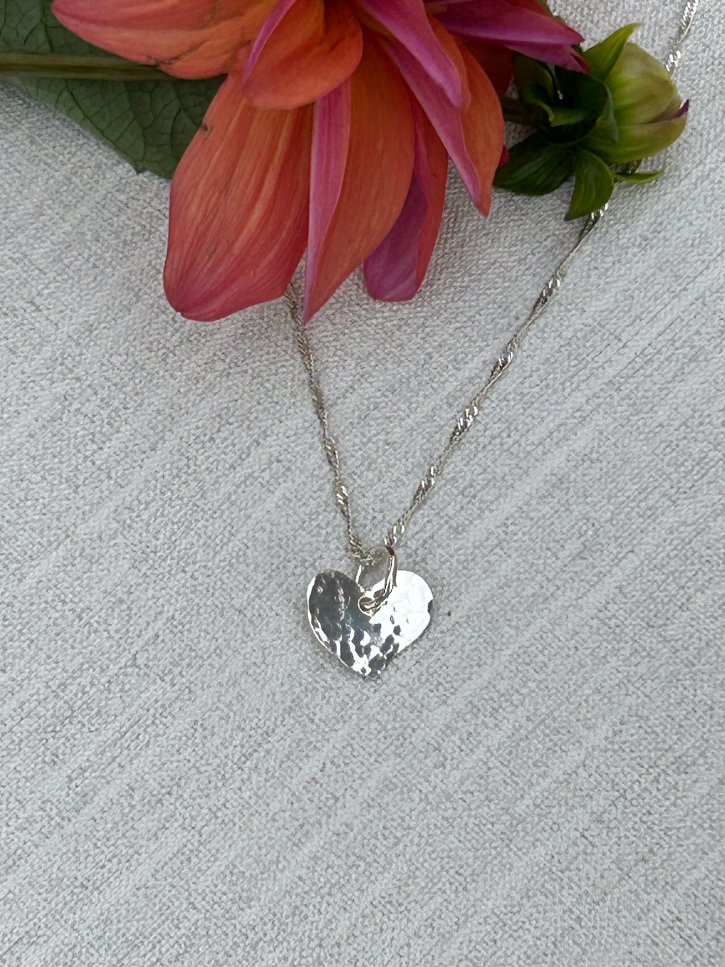 Silver necklace with a heart pendant