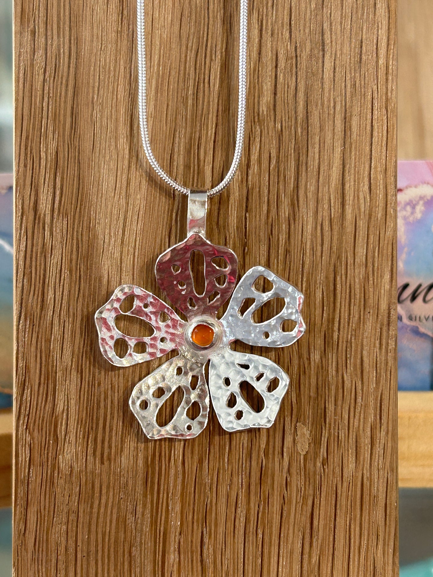 handcrafted sterling Silver flower-shaped pendant