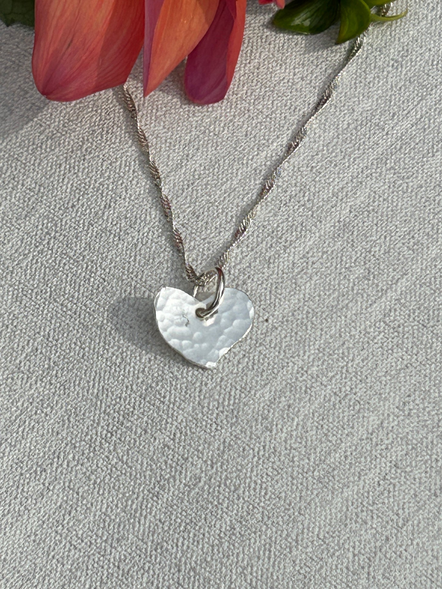 Small handmade sterling silver hammered heart pendant