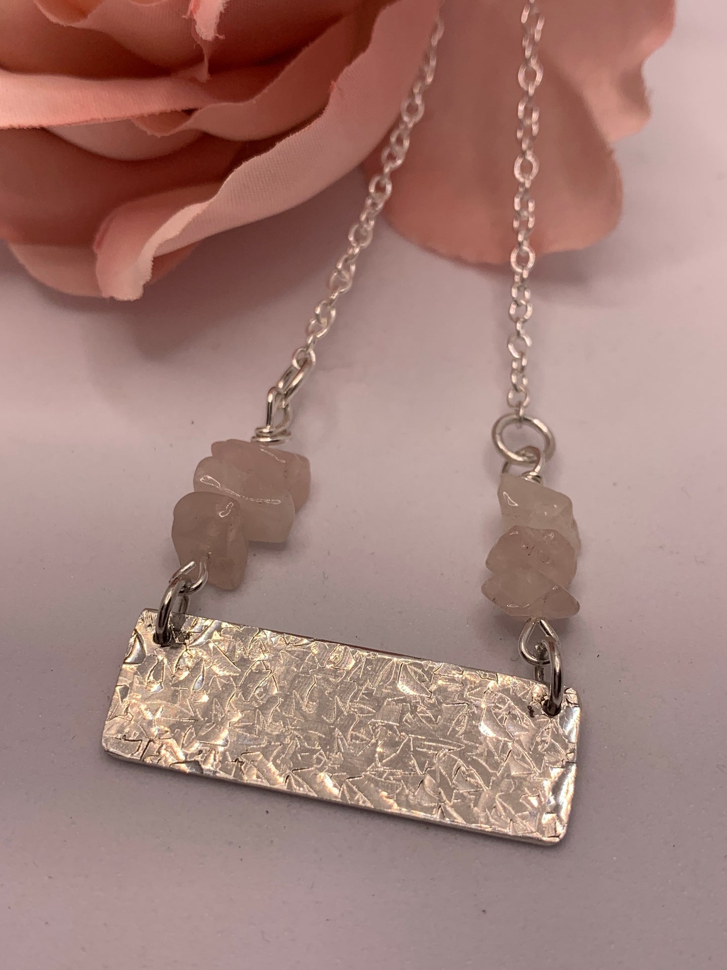 Handmade sterling silver hammered bar necklace with rose quartz