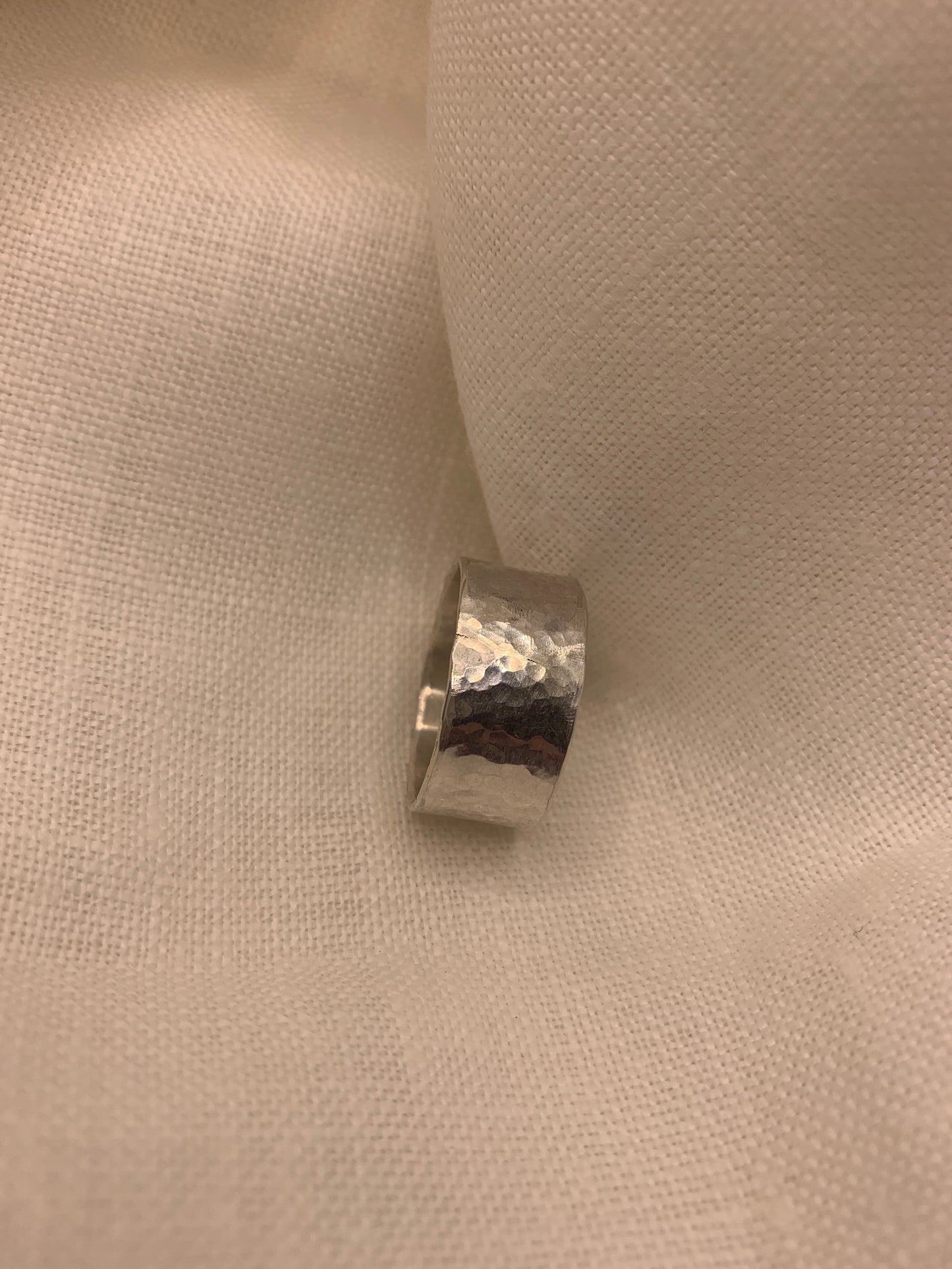 Handmade sterling silver hammered wide ring