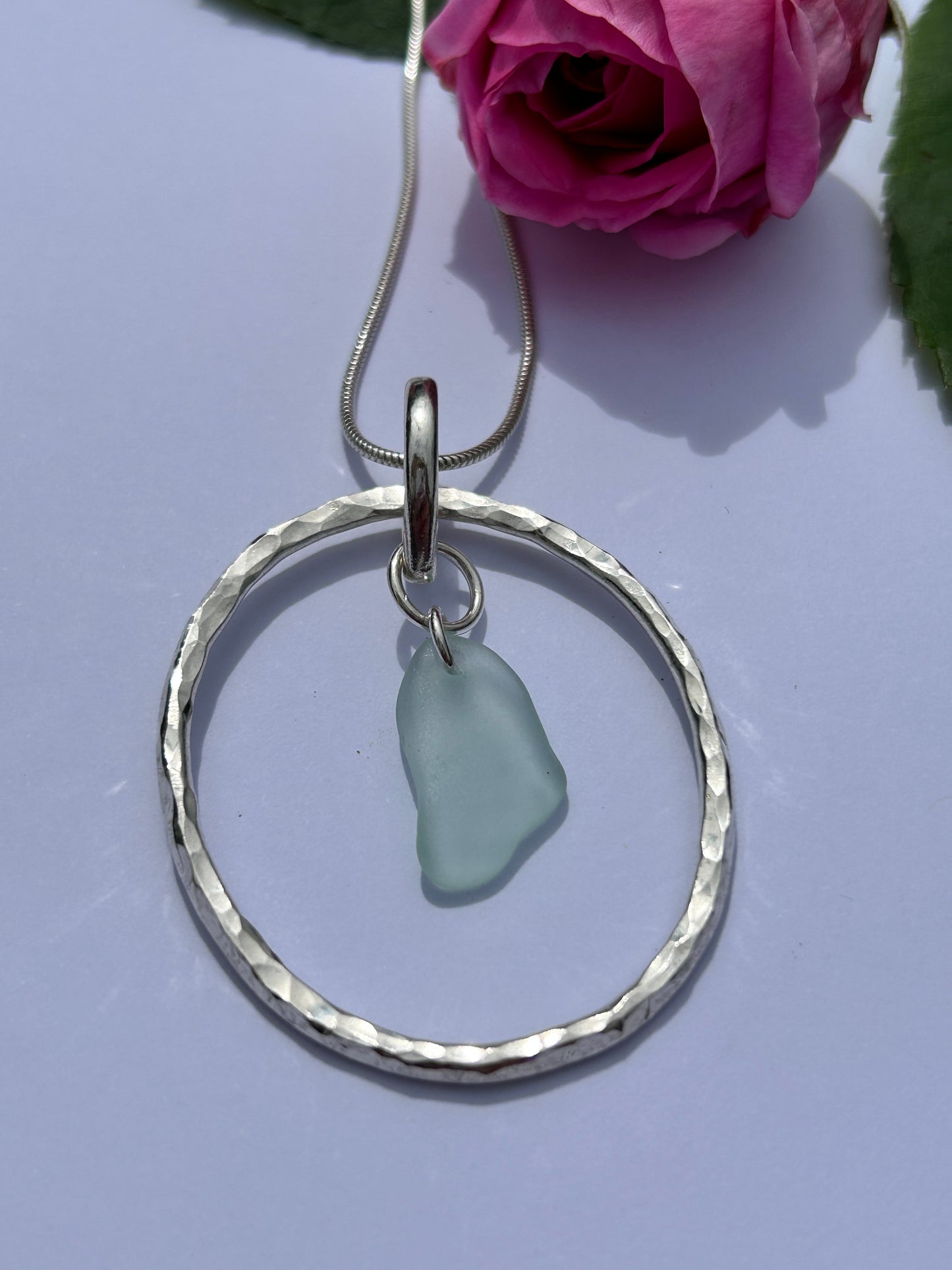 Handmade sterling silver circle pendant with sea glass