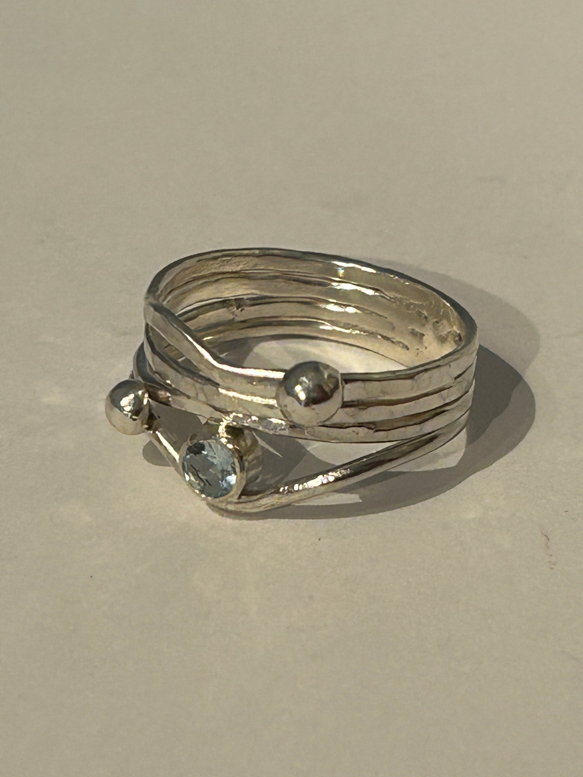 Handmade sterling silver and blue topaz ring