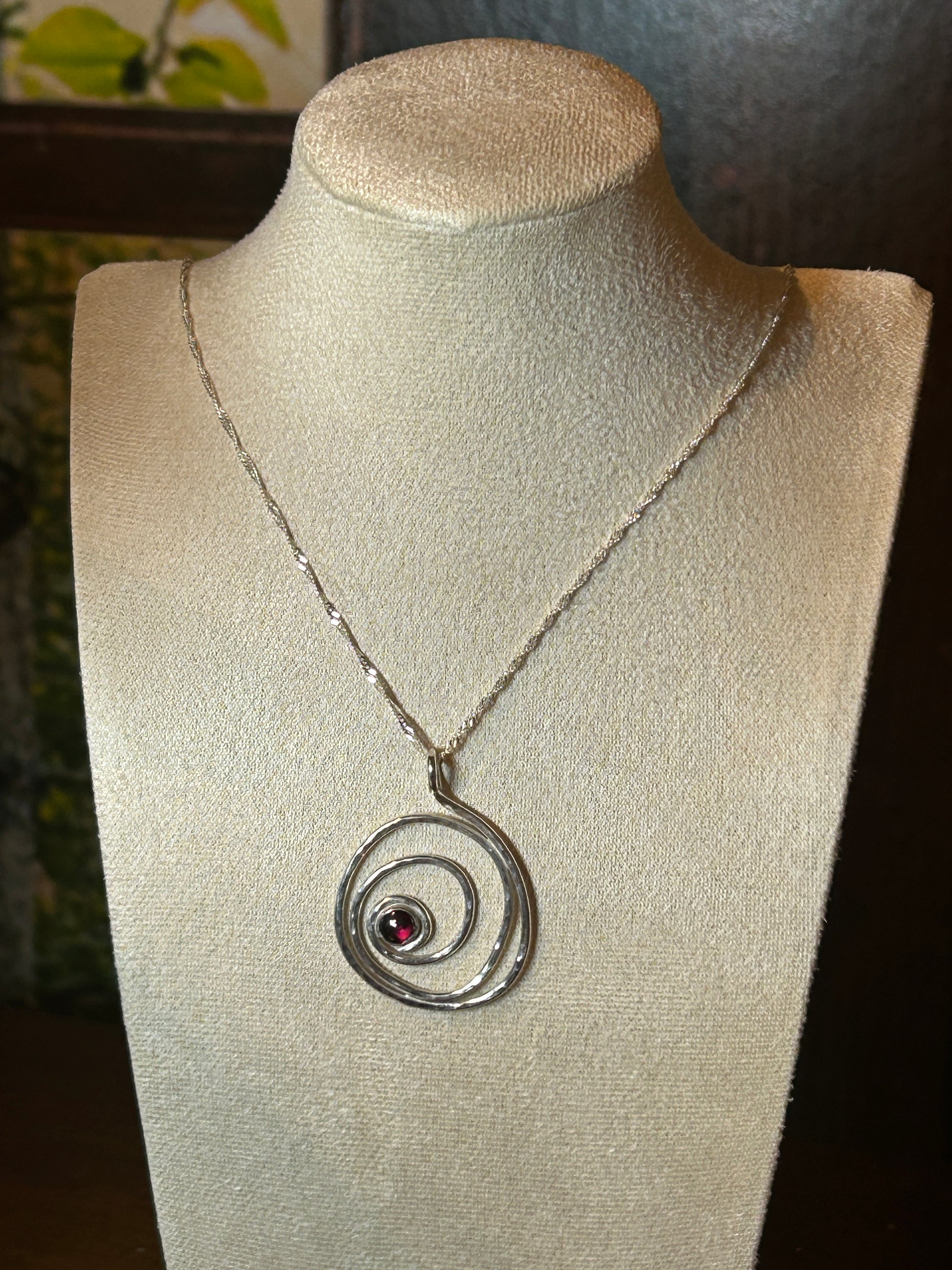 Handmade sterling silver hammered garnet pendant 